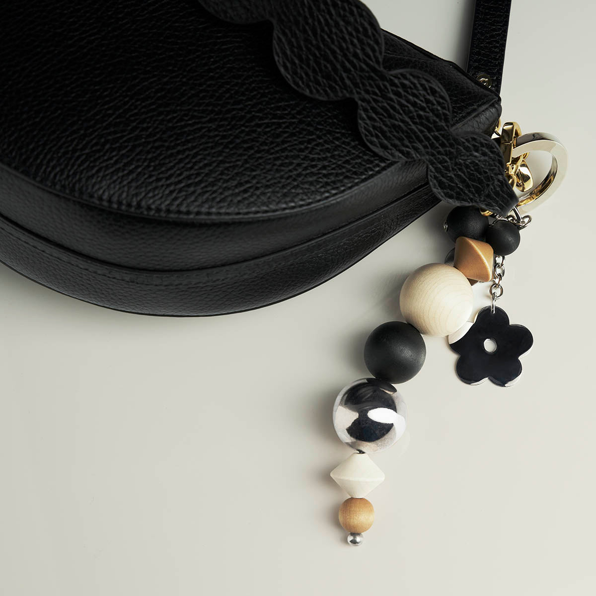 Lemmikki bag charm, varnished wood