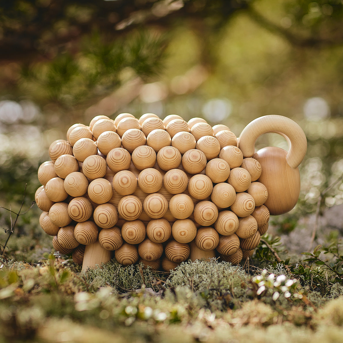 Pässi figurine, varnished wood