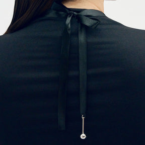 Gaala necklace, varnished wood
