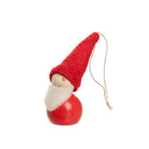 A small wooden elf ornament with a red felt hat, white faux-fur beard, and a glossy red base, shown on a plain white background.