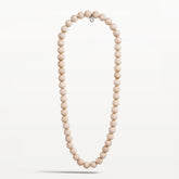 Suometar necklace, varnished wood