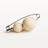 Olos brooch, varnished wood