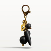 Ronja bag charm, black and gold