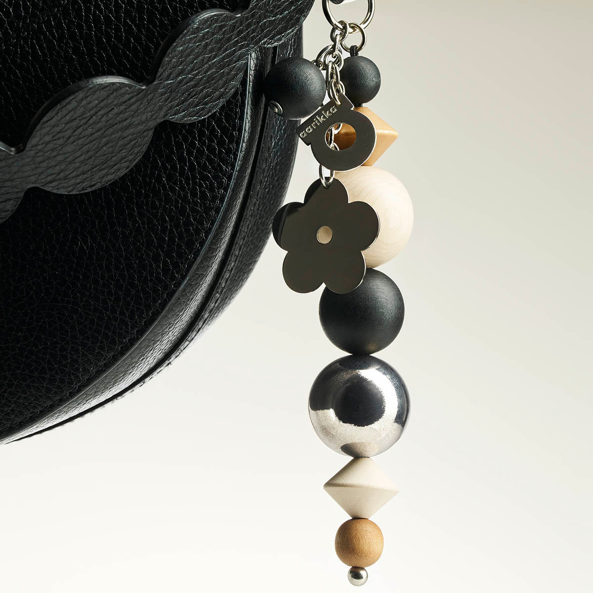 Lemmikki bag charm, varnished wood