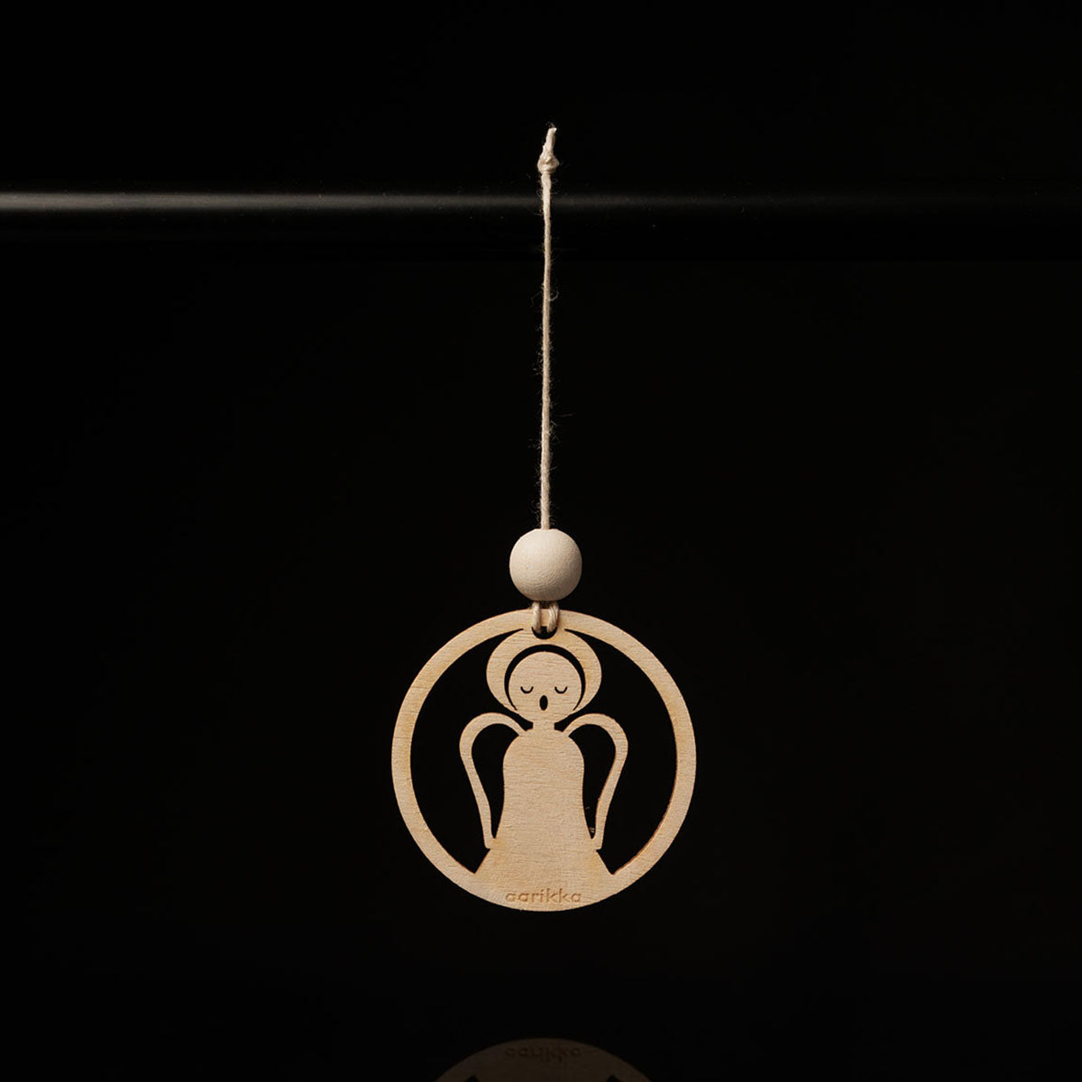 Angel ornament, varnished wood