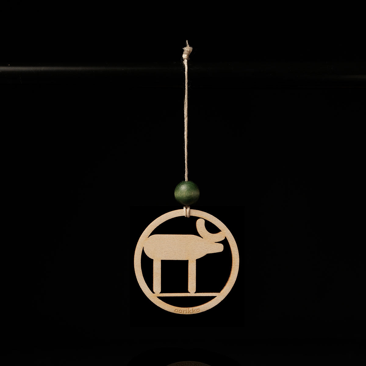 Reindeer ornament, varnished wood